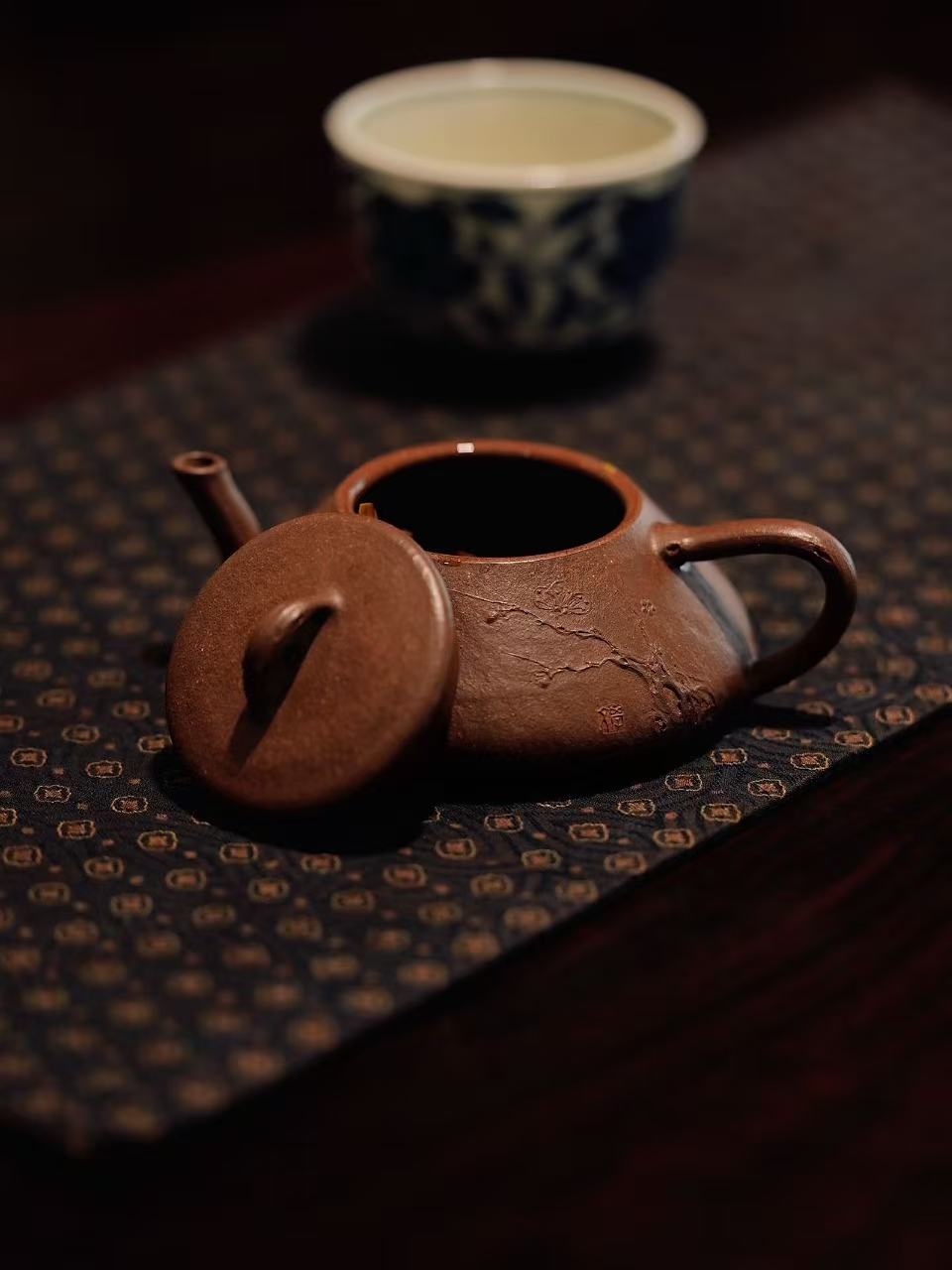 Teapot with incised plum branch
