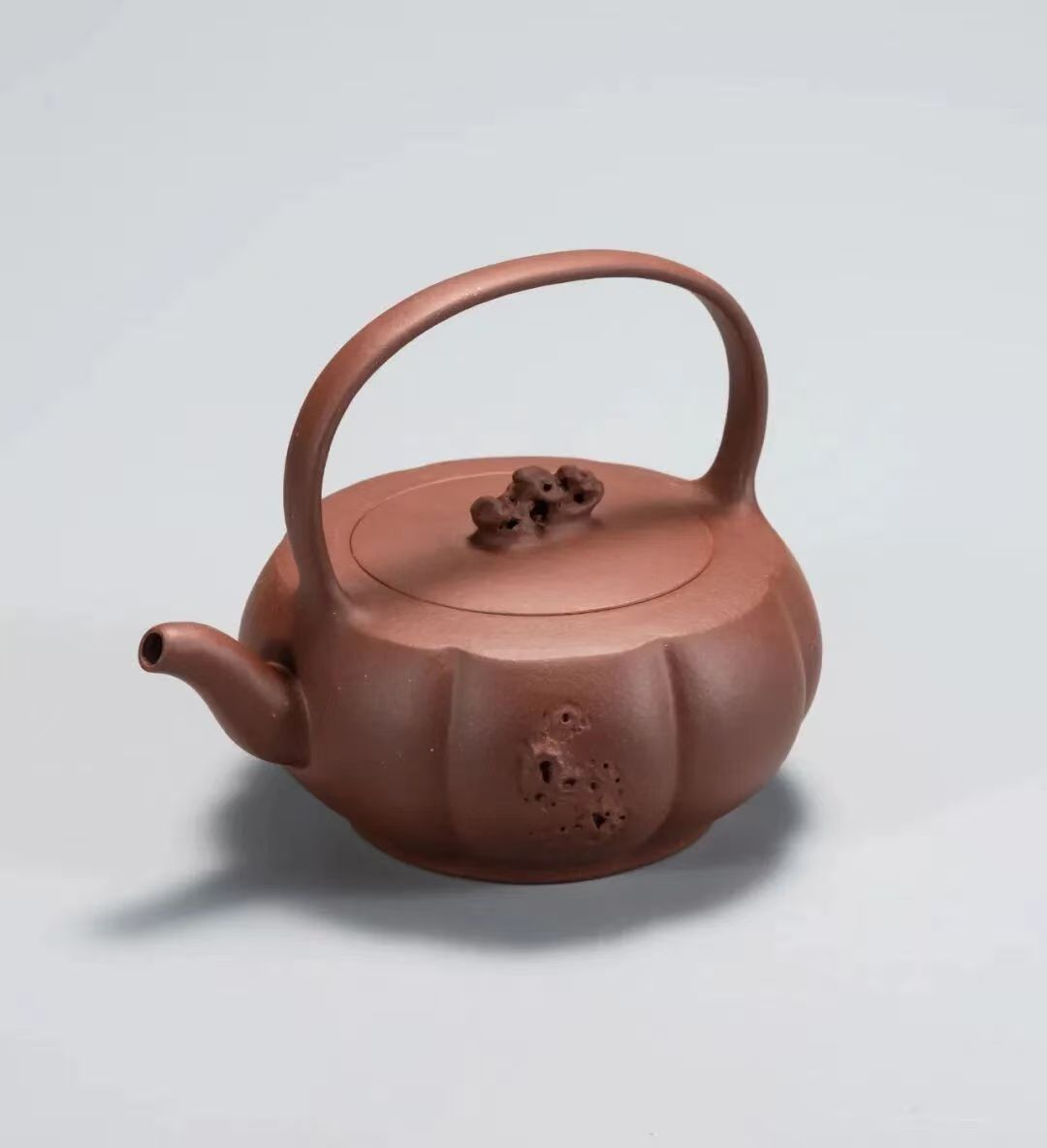 Bridge-handle melon kettle